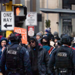 Minneapolis Police and Anti-ICE Protesters 1 The scene outside the Minneapolis hotel Jake Lang was chased in and out of by counter protesters who chased him out of downtown.Minneapolis police showed up to clear the streets before moving on a short time later. Protesters continued marching on.