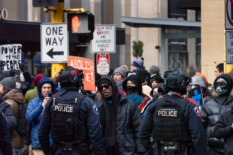 Minneapolis Police and Anti-ICE Protesters 4 The scene outside the Minneapolis hotel Jake Lang was chased in and out of by counter protesters who chased him out of downtown.Minneapolis police showed up to clear the streets before moving on a short time later. Protesters continued marching on.