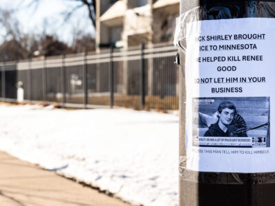 Minneapolis Protest Sign: Nick Shirley Accused of ICE Involvement