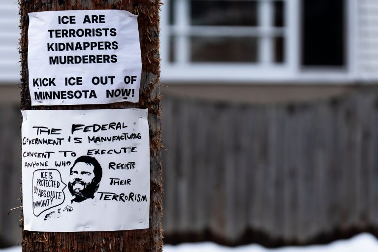 Powderhorn Park Protest Signs Against ICE, Minneapolis 4 Protest signs against ICE are posted on a utility pole in Powderhorn Park, Minneapolis.
