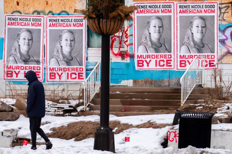 Minneapolis Protest Posters: Renee Good, American Mom, Murdered by ICE 2 Posters of Renee Nicole Good on a Lake Street building in Minneapolis, reading “American Mom” and “Murdered by ICE”