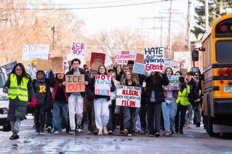 Roosevelt High School Students Protest ICE in Minneapolis 4 Students protest ICE in Minneapolis, holding signs against family separation and "illegal" immigration.