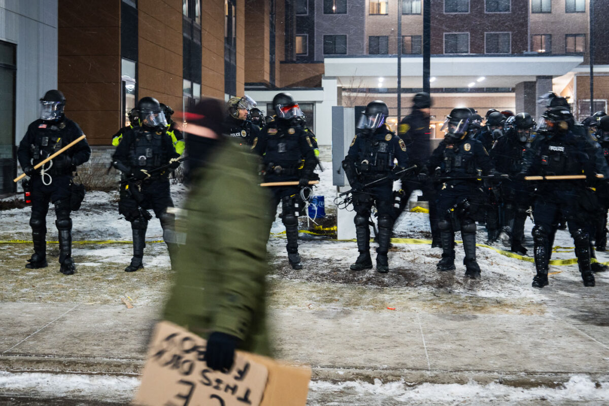 Anti-ICE protesters and police officers in riot gear outside a Noise Demonstration at Springhill Suites on January 26, 2026 in Maple Grove, Minnesota.
