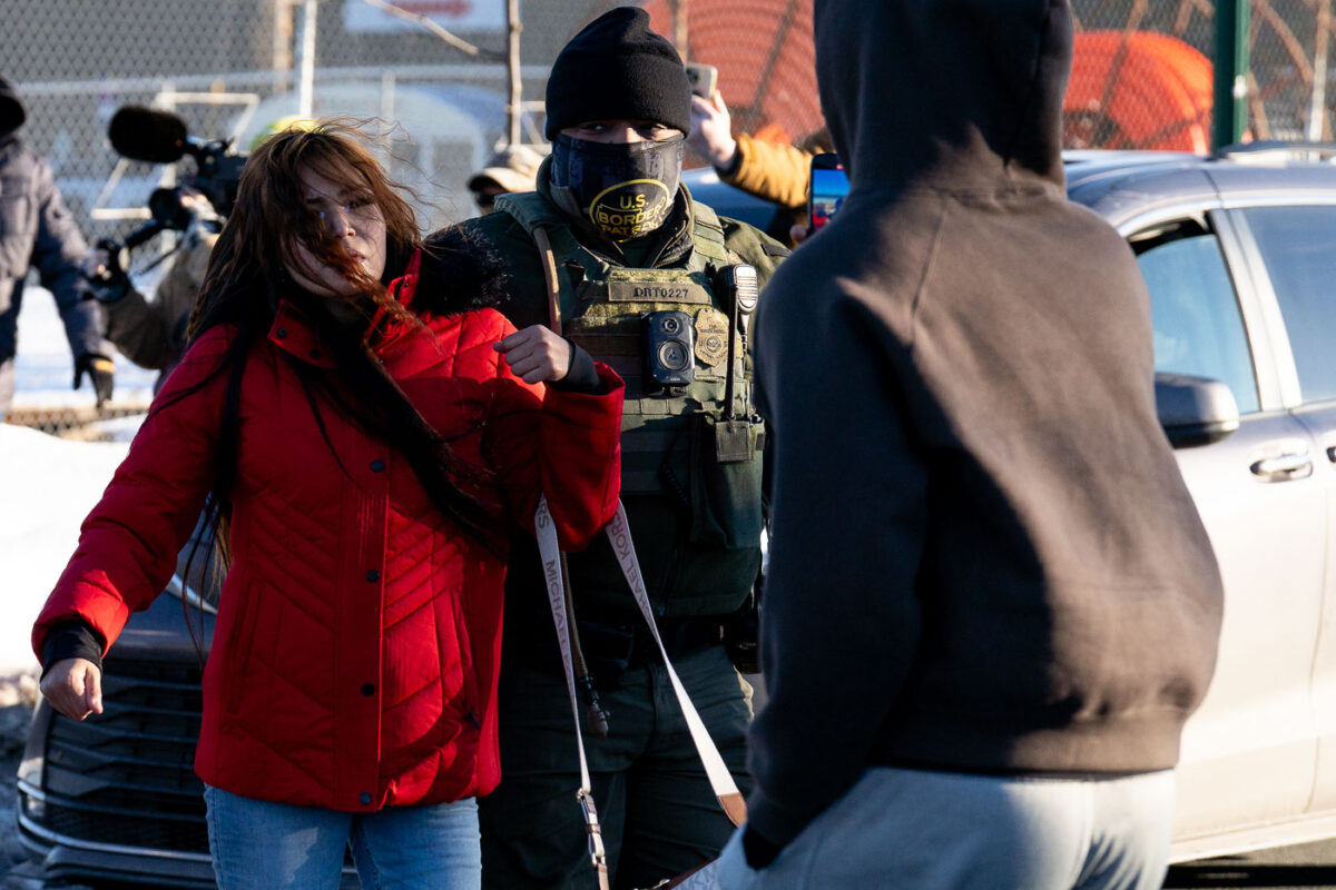 US Border Patrol detains someone near a bus stop on Lake Street and Nicollet Avenue in Minneapolis on January 14, 2026.
