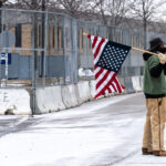 William Kelly Protests at the Whipple Building 1 Protester William Kelly, also known as "dawokefarmer", protests at the Whipple building near Minneapolis on January 15, 2026.