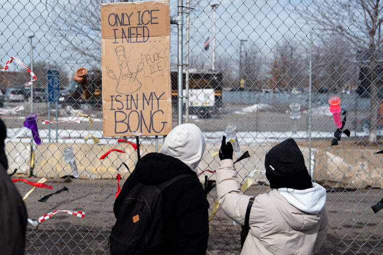 ANTI ICE Bong Protest Sign, Minneapolis 3 This afternoon at the Whipple building where expired dicks were being thrown at ICE vehicles and those believed to be agitators. The building has been used as a “base” for the thousands of federal agents that have arrived in Minnesota as well as a holding center for those detained.The area has been a place of protest since December.Protest sign that reads "Only ice i need is in my bong".