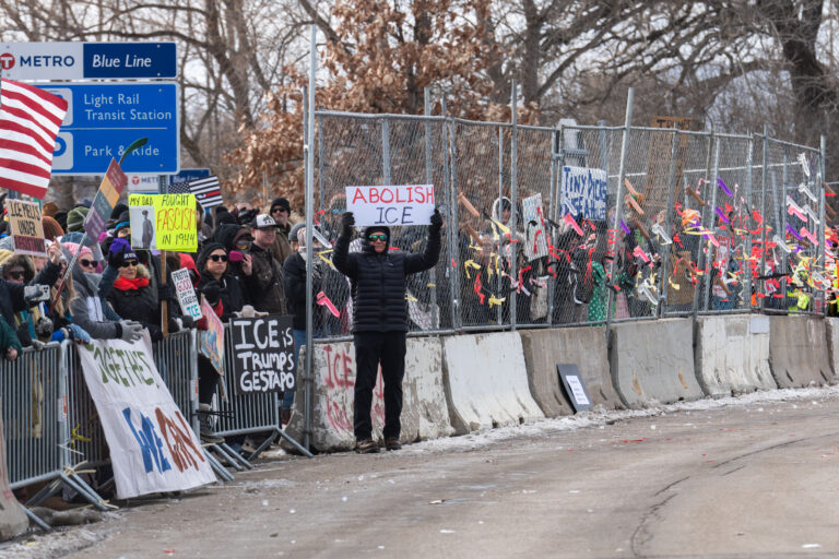 Protesters at Whipple Federal Building, Minneapolis, February 2 Protesters gathered outside the Whipple Federal Building in Minneapolis, holding signs against ICE.