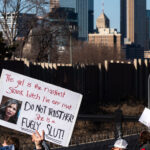 Anti Kristi Noem protest sign in Minneapolis 3 Today in Minneapolis, those demanding justice for everyone shot and/or killed by federal agents over the last 2 months, protesters marched from Stewart Park to the memorial of Alex Pretti. Pretti was shot and killed by border patrol agents while he was unarmed on January 24, 2026. Video shows agents removing a gun from Pretti prior to shots being fired.The “Day Out For Democracy” rally and march was organized by Minnesota AFL-CIO.