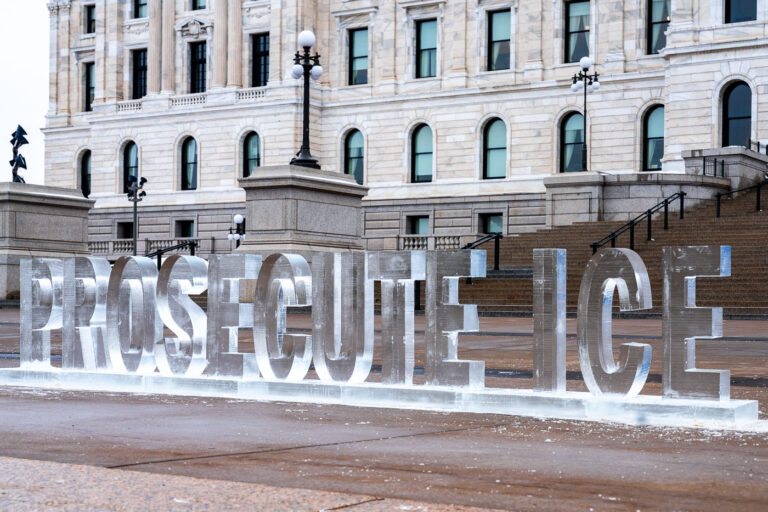 Common Defense Prosecute ICE Sculpture in Minnesota 1 An ice sculpture that reads "PROSECUTE ICE" at the Minnesota State Capitol on January 5, 2026. I'm told the organization behind the sculpture is Common Defense.