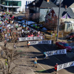 Day Out For Democracy 2026 AFL CIO Protest Minneapolis 3 Today in Minneapolis, those demanding justice for everyone shot and/or killed by federal agents over the last 2 months, protesters marched from Stewart Park to the memorial of Alex Pretti. Pretti was shot and killed by border patrol agents while he was unarmed on January 24, 2026. Video shows agents removing a gun from Pretti prior to shots being fired.The “Day Out For Democracy” rally and march was organized by Minnesota AFL-CIO.