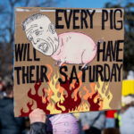 Greg Bovino protest sign in Minneapolis 2 Today in Minneapolis, those demanding justice for everyone shot and/or killed by federal agents over the last 2 months, protesters marched from Stewart Park to the memorial of Alex Pretti. Pretti was shot and killed by border patrol agents while he was unarmed on January 24, 2026. Video shows agents removing a gun from Pretti prior to shots being fired.The “Day Out For Democracy” rally and march was organized by Minnesota AFL-CIO.