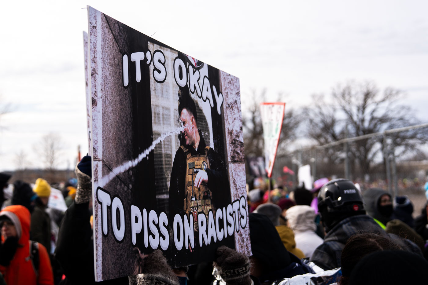 Jake Lang Protest Sign in Minneapolis