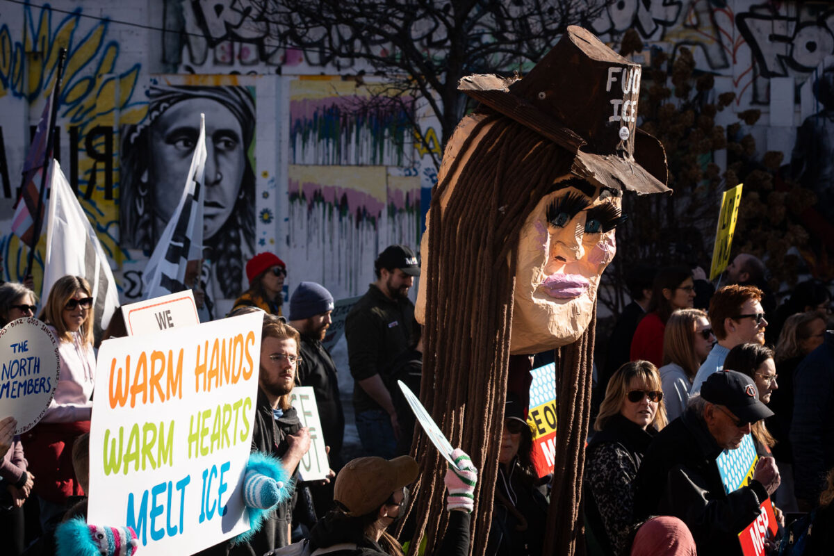 Today in Minneapolis, those demanding justice for everyone shot and/or killed by federal agents over the last 2 months, protesters marched from Stewart Park to the memorial of Alex Pretti.
Pretti was shot and killed by border patrol agents while he was unarmed on January 24, 2026. Video shows agents removing a gun from Pretti prior to shots being fired.
The “Day Out For Democracy” rally and march was organized by Minnesota AFL-CIO.