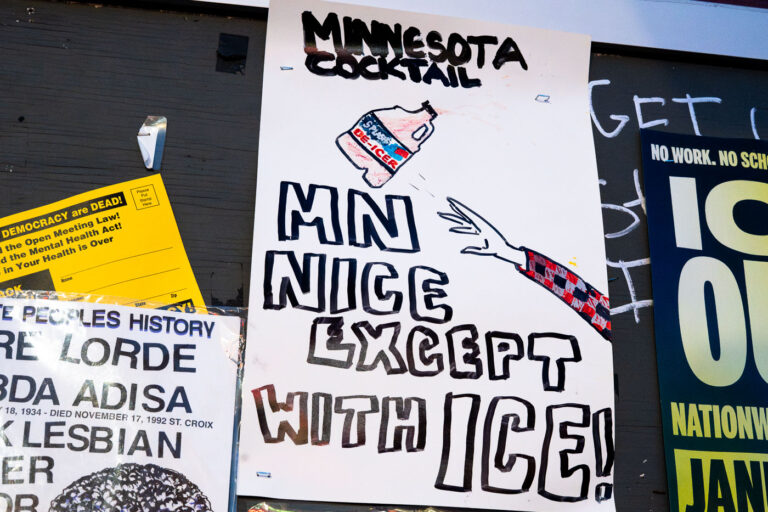Minnesota Cocktail Anti ICE Protest Sign 3 A protest sign at George Floyd Square reading "MINNESOTA COCKTAIL MN NICE EXCEPT WITH ICE!"