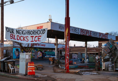 An "Our Neighborhood Blocks ICE" sign at George Floyd Square in Minneapolis on February 12, 2026.

The sign hangs at the corner of Chicago Avenue and 38th Street in what has continued to be a place of protest since the murder of George Floyd. The sign hangs during "Operation Metro Surge", the name of the government operation that has sent thousands of federal agents into the city.