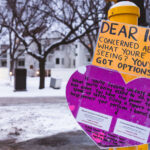 Sign Addressed to ICE, Minneapolis 4 Heart shaped sign seen in Minneapolis addressed to ICE:“If you’re feeling uneasy about what you’re being asked to do, you’re not alone. You have the power to speak up safely. Filing a report will also help protect your pension & bonus"Numbers given for DHS Office of Inspector General and Office of Special Counsel.Minneapolis February 2, 2026