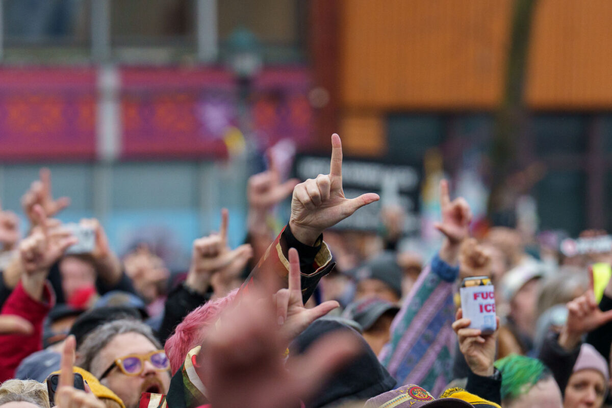 People raise their hands during "First Class Loser".Dropkick Murphys perform at a benefit concert across the street from where Alex Pretti was killed by federal agents. Dropkick Murphys finished their acoustic set with "I'm Shipping Up to Boston". Their set was part of a 7 hour benefit show across from where Alex Pretti was killed by federal agents on January 24. A little over a mile from where Renee Good was killed 17 days prior.“We’ll never forget what we saw with our own eyes, we’ll never forget what we’ve seen here today. Thank you all for allowing us to come bear witness with you, thank you Minnesota!”.