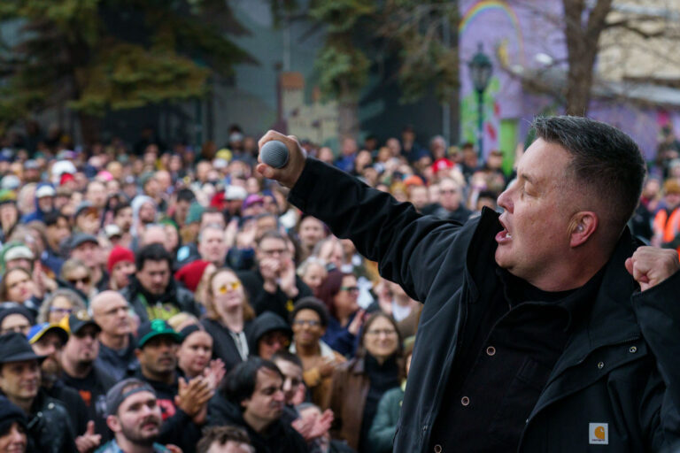 Ken Casey at ABOLISH ICE benefit show 1 Dropkick Murphys perform at a benefit concert across the street from where Alex Pretti was killed by federal agents.
Dropkick Murphys finished their acoustic set with "I'm Shipping Up to Boston".
Their set was part of a 7 hour benefit show across from where Alex Pretti was killed by federal agents on January 24. A little over a mile from where Renee Good was killed 17 days prior.
“We’ll never forget what we saw with our own eyes, we’ll never forget what we’ve seen here today. Thank you all for allowing us to come bear witness with you, thank you Minnesota!”.