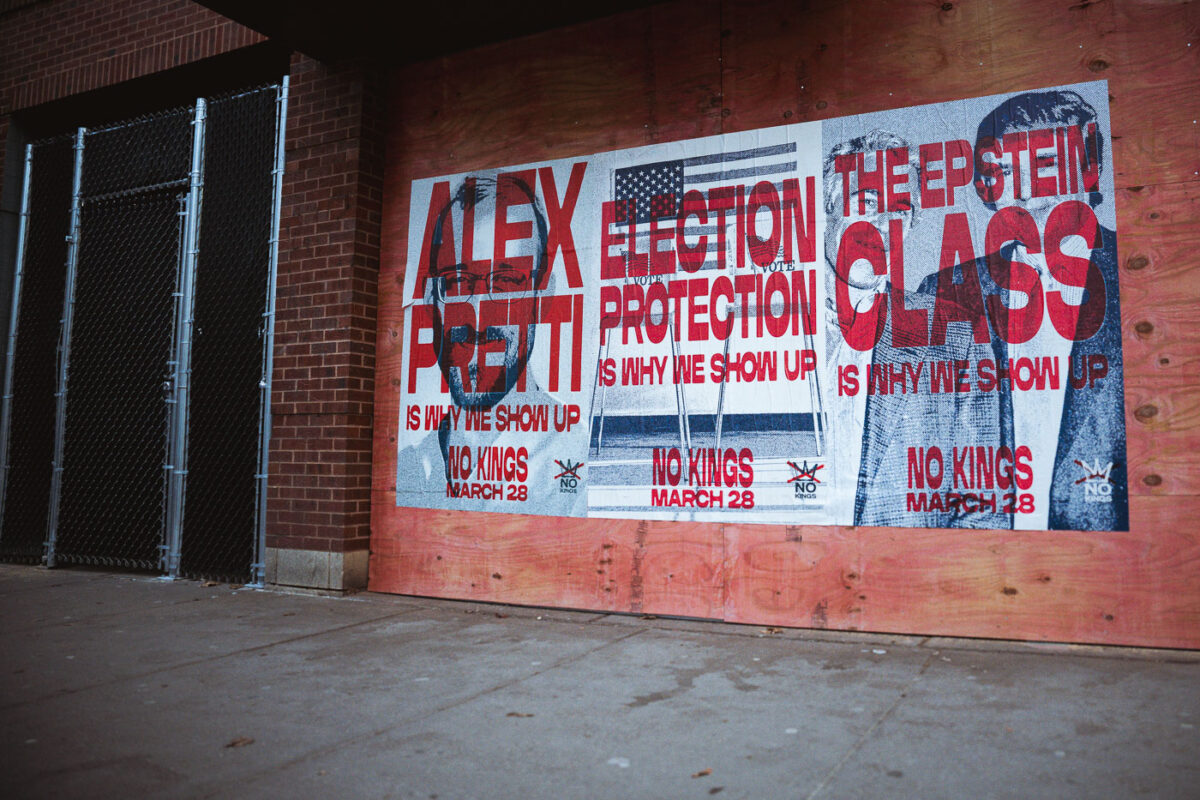 Protest posters in Uptown Minneapolis advocate for Alex Pretti, election protection, and "No Kings" on March 28, displayed on a plywood-covered wall.
