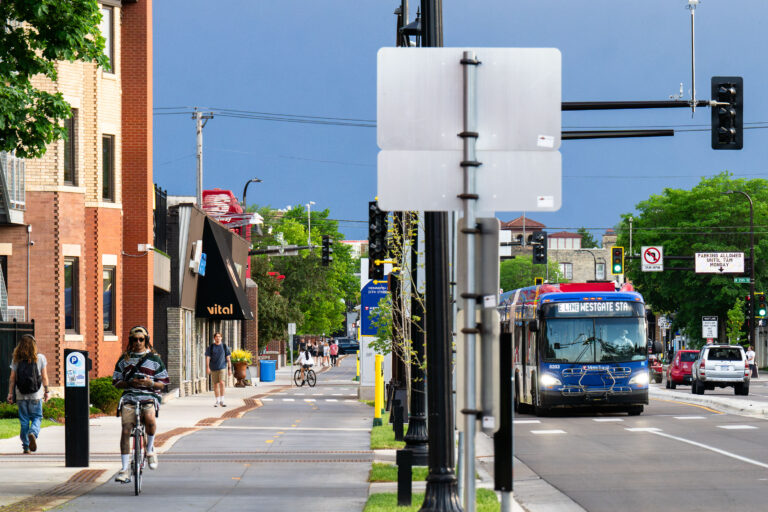 Completed Hennepin Avenue Bike Lanes and Road Construction 4 Bikers and walkers ion newly built bike lanes on Hennepin Avenue