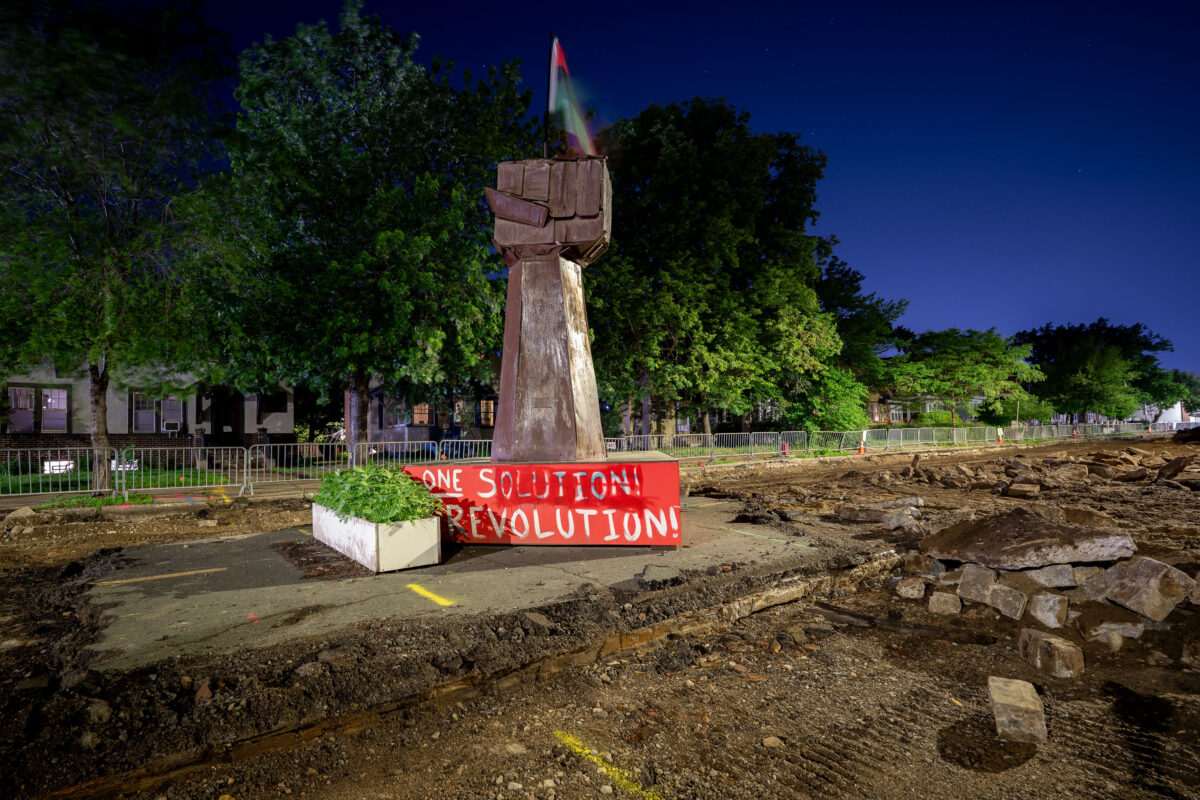 George Floyd Fist on and Island of Road Construction