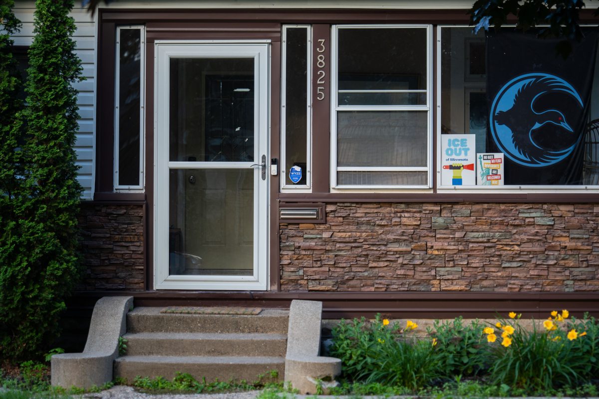 South Minneapolis home with Anti ICE posters and flag