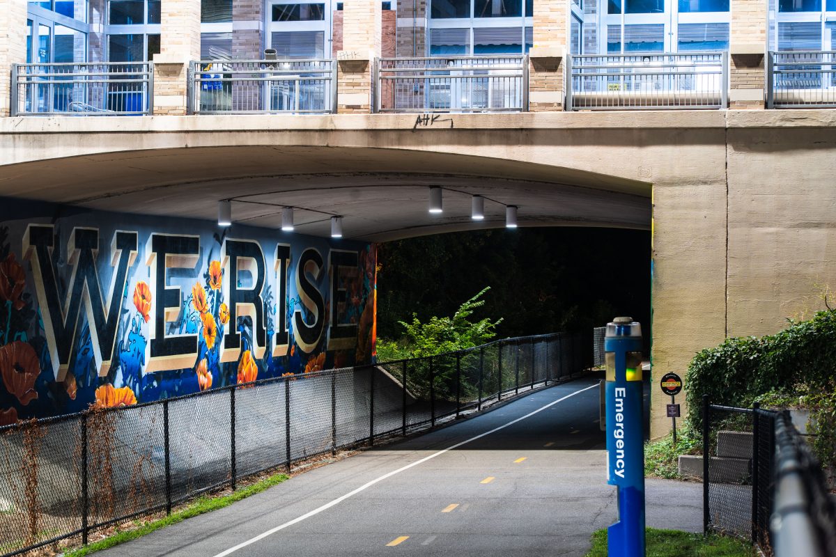 WE RISE mural under Hennepin Avenue in Minneapolis