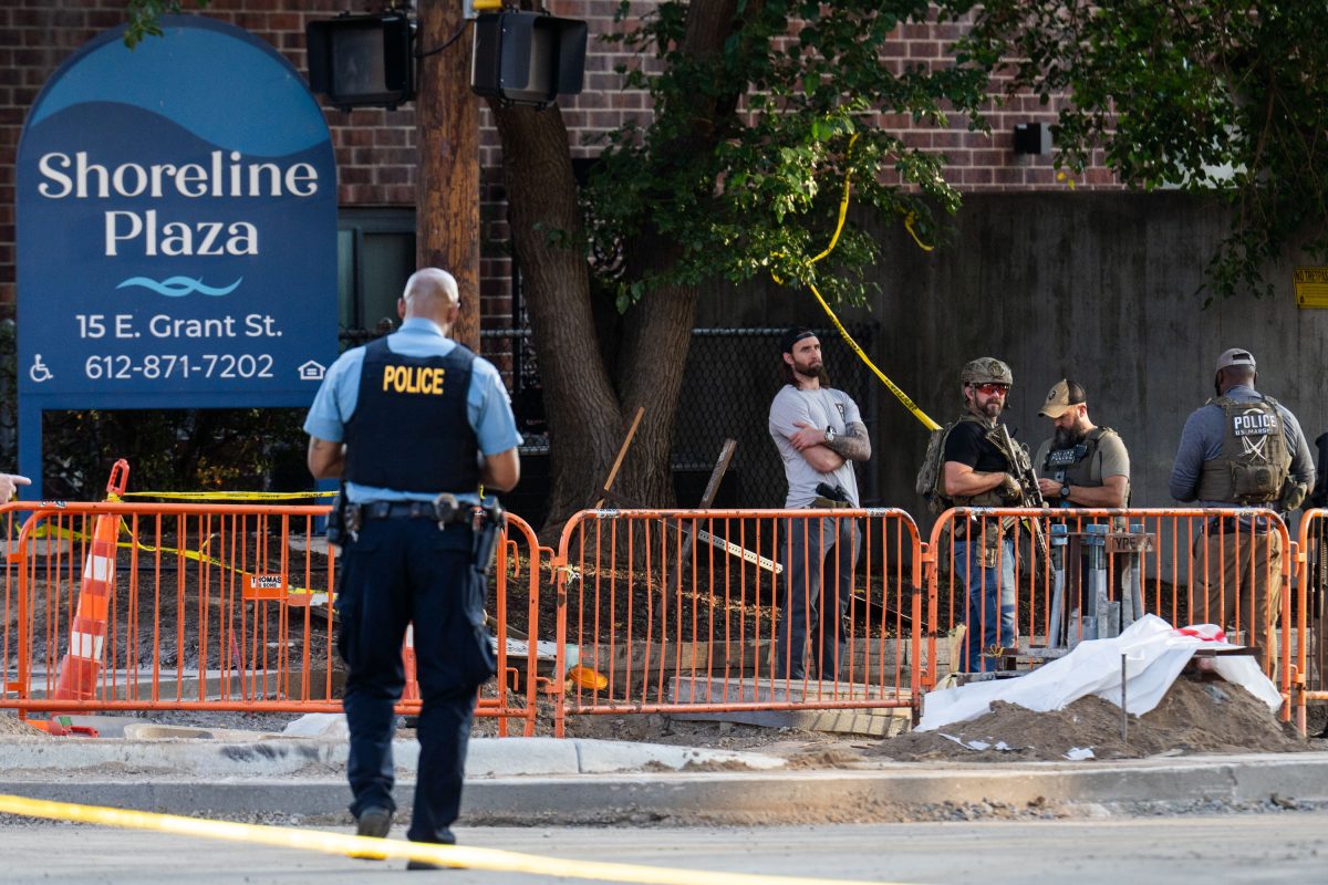 Armed federal agents at Shoreline Plaza in Minneapolis