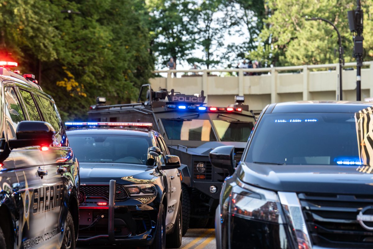 Police vehicles outside September 2026 mass shooting in Minneapolis