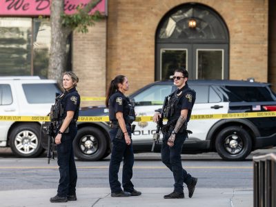Robbinsdale Officers Behind Police Tape Near Shoreline Plaza