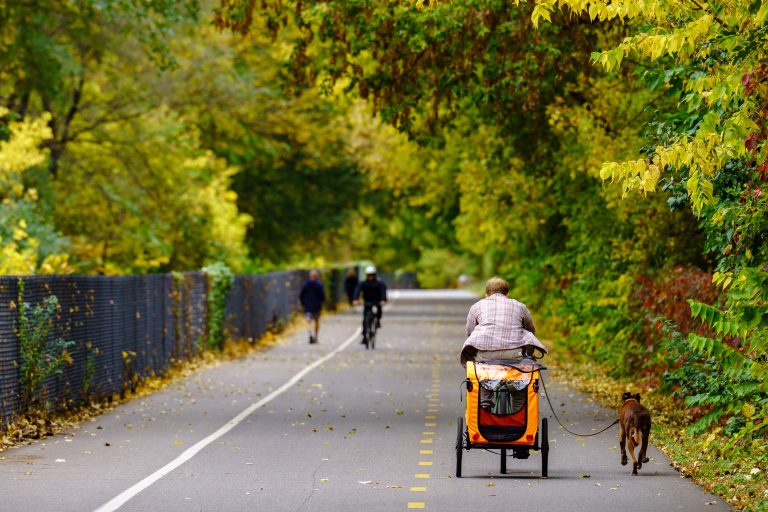 A man and his dog on the Midtown Greenway