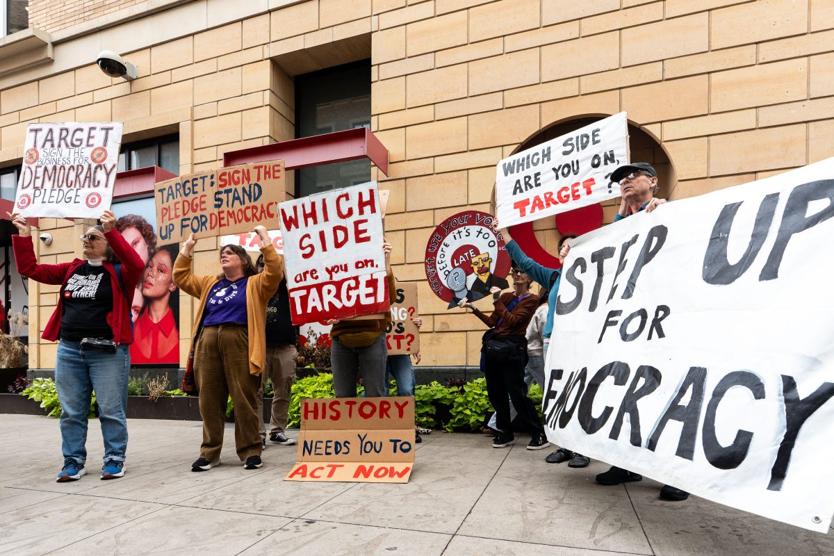 Protesters demand Target sign the Democracy Pledge