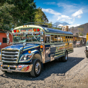 A Chicken Bus in Antigua Guatemala. The buses are commonly used as transportation in Latin America. A Chicken Bus in Antigua Guatemala. The buses are commonly used as transportation in Latin America.
