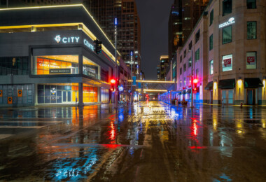 A rainy night in Downtown Minneapolis outside City Center during the early days of COVID-19. A rainy night in Downtown Minneapolis outside City Center during the early days of COVID-19.