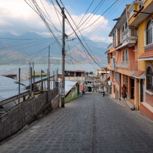 March 3, 2020 - San Pedro, Guatemala -- A woman walks in front of a jewelry and art gallery in San Pedro. March 3, 2020 - San Pedro, Guatemala -- A woman walks in front of a jewelry and art gallery in San Pedro.