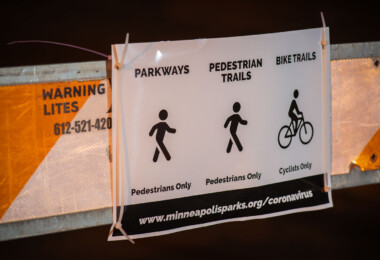 Minneapolis parks coronavirus signage on closed streets during COVID-19. Minneapolis parks coronavirus signage on closed streets during COVID-19.