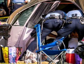 Minneapolis Park police remove the homeless from their tents at Powderhorn Park in South Minneapolis on July 20th, 2020.