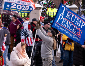Trump supporters gather at the Minnesota Governor’s Residence after a “Storm The Capitol” event at the Minnesota State Capitol.