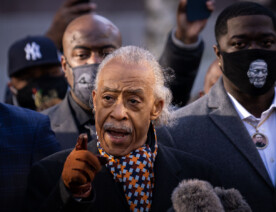 Rev Al Sharpton speaks outside the Hennepin County Government Center where opening statements of the Derek Chauvin trial were set to begin. He's joined by George Floyd's brothers Philonise and Terrence Floyd.