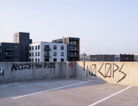 The top of the parking ramp that Winston Smith was killed in.Winston Smith was killed by Hennepin and Ramsey County Sheriffs officers who were part of a Federal Task Force on June 3rd.   On June 10th, Deona Marie was killed when a protester drove his vehicle through barricades setup to protect those protesting the death of Winston Smith.