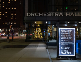 Sign outside Orchestra Hall in Downtown Minneapolis that reads: “Music teaches us the value of listening. There is more for us to hear and more for us to do. Black Lives Matter”.