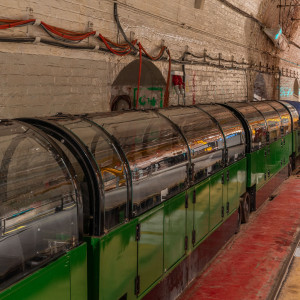 The Post Office Railway, known as Mail Rail since 1987, is a 2 ft (610 mm) narrow gauge, driverless underground railway in London that was built by the Post Office with assistance from the Underground Electric Railways Company of London, to move mail between sorting offices. Inspired by the Chicago Tunnel Company, it operated from 1927 until 2003. A museum within the former railway was opened in September 2017. Source: <a href="https://en.wikipedia.org/wiki/London_Post_Office_Railway" rel="noreferrer nofollow">en.wikipedia.org/wiki/London_Post_Office_Railway</a> The Post Office Railway, known as Mail Rail since 1987, is a 2 ft (610 mm) narrow gauge, driverless underground railway in London that was built by the Post Office with assistance from the Underground Electric Railways Company of London, to move mail between sorting offices. Inspired by the Chicago Tunnel Company, it operated from 1927 until 2003. A museum within the former railway was opened in September 2017. Source: <a href="https://en.wikipedia.org/wiki/London_Post_Office_Railway" rel="noreferrer nofollow">en.wikipedia.org/wiki/London_Post_Office_Railway</a>