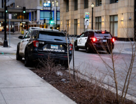 Minneapolis Police squad car on the sidewalk in Downtown Minneapolis.