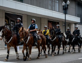 Mounted Patrol in downtown Minneapolis during a Minnesota Timberwolves Western Conference Finals playoff game.