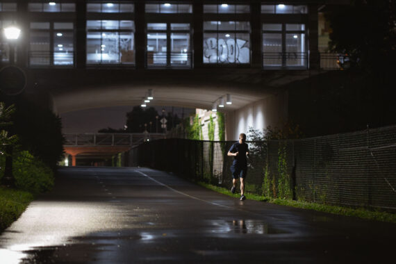 A jogger on the Midtown Greenway after rain moves through the area. The Greenway runs through South Minneapolis. A jogger on the Midtown Greenway after rain moves through the area. The Greenway runs through South Minneapolis.