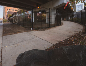 New fencing dropped in the North Loop on N 5th Ave and I-94. It's too bad, was a fun spot to watch trains.  Could see the Light Rail, Northstar Line and freight trains from under this bridge.