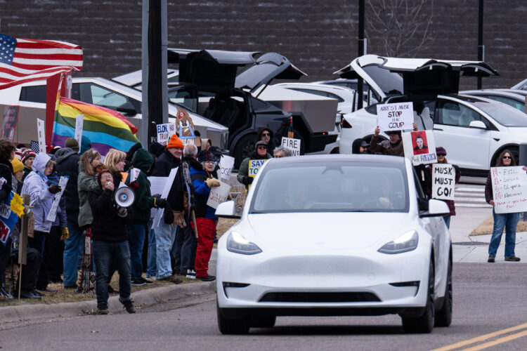 About 500 protesters outside Tesla in Minneapolis (Golden Valley) with signs reading “NOT PAID JUST PISSED”, “Tesla Funds Fascists”, “Save the VA”, “No Vet Left Behind”, Make Nazis Afraid Again” to name a few. This is the 7th weekend in a row of protests at this showroom. About 500 protesters outside Tesla in Minneapolis (Golden Valley) with signs reading “NOT PAID JUST PISSED”, “Tesla Funds Fascists”, “Save the VA”, “No Vet Left Behind”, Make Nazis Afraid Again” to name a few. This is the 7th weekend in a row of protests at this showroom.