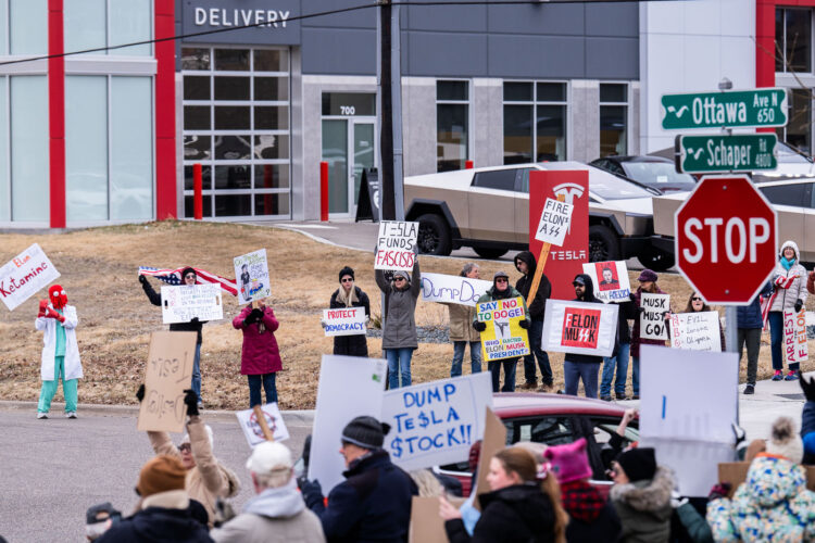 About 500 protesters outside Tesla in Minneapolis (Golden Valley) with signs reading “NOT PAID JUST PISSED”, “Tesla Funds Fascists”, “Save the VA”, “No Vet Left Behind”, Make Nazis Afraid Again” to name a few. This is the 7th weekend in a row of protests at this showroom. About 500 protesters outside Tesla in Minneapolis (Golden Valley) with signs reading “NOT PAID JUST PISSED”, “Tesla Funds Fascists”, “Save the VA”, “No Vet Left Behind”, Make Nazis Afraid Again” to name a few. This is the 7th weekend in a row of protests at this showroom.