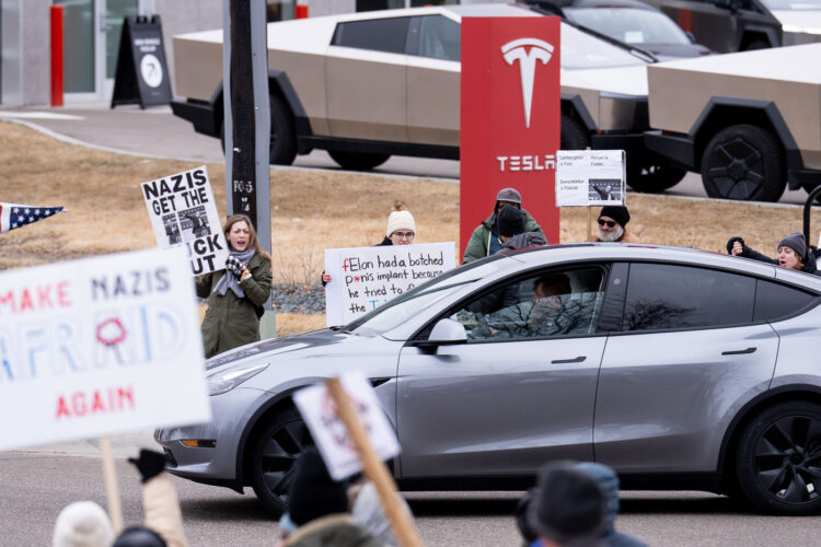 About 500 protesters outside Tesla in Minneapolis (Golden Valley) with signs reading “NOT PAID JUST PISSED”, “Tesla Funds Fascists”, “Save the VA”, “No Vet Left Behind”, Make Nazis Afraid Again” to name a few. This is the 7th weekend in a row of protests at this showroom. About 500 protesters outside Tesla in Minneapolis (Golden Valley) with signs reading “NOT PAID JUST PISSED”, “Tesla Funds Fascists”, “Save the VA”, “No Vet Left Behind”, Make Nazis Afraid Again” to name a few. This is the 7th weekend in a row of protests at this showroom.