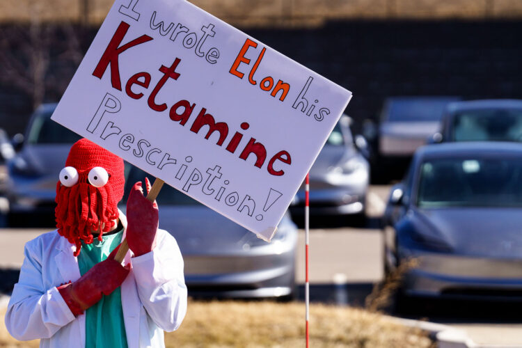 A protester at the Tesla facility just outside of Minneapolis (Golden Valley) on March 1, 2025.Protesters have been gathering each Saturday for weeks now protesting Elon Musk, Tesla and the current administration. A protester at the Tesla facility just outside of Minneapolis (Golden Valley) on March 1, 2025.Protesters have been gathering each Saturday for weeks now protesting Elon Musk, Tesla and the current administration.